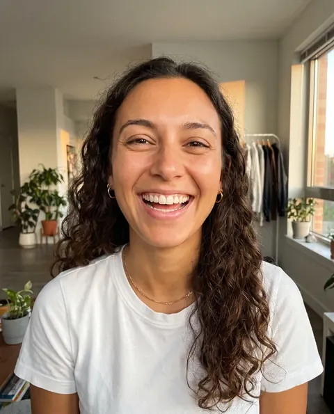 Maya, AI presenter, in a white t-shirt