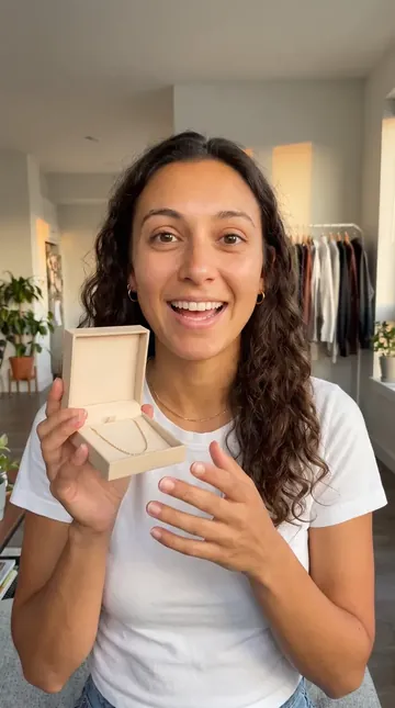Maya opening a jewelry box
